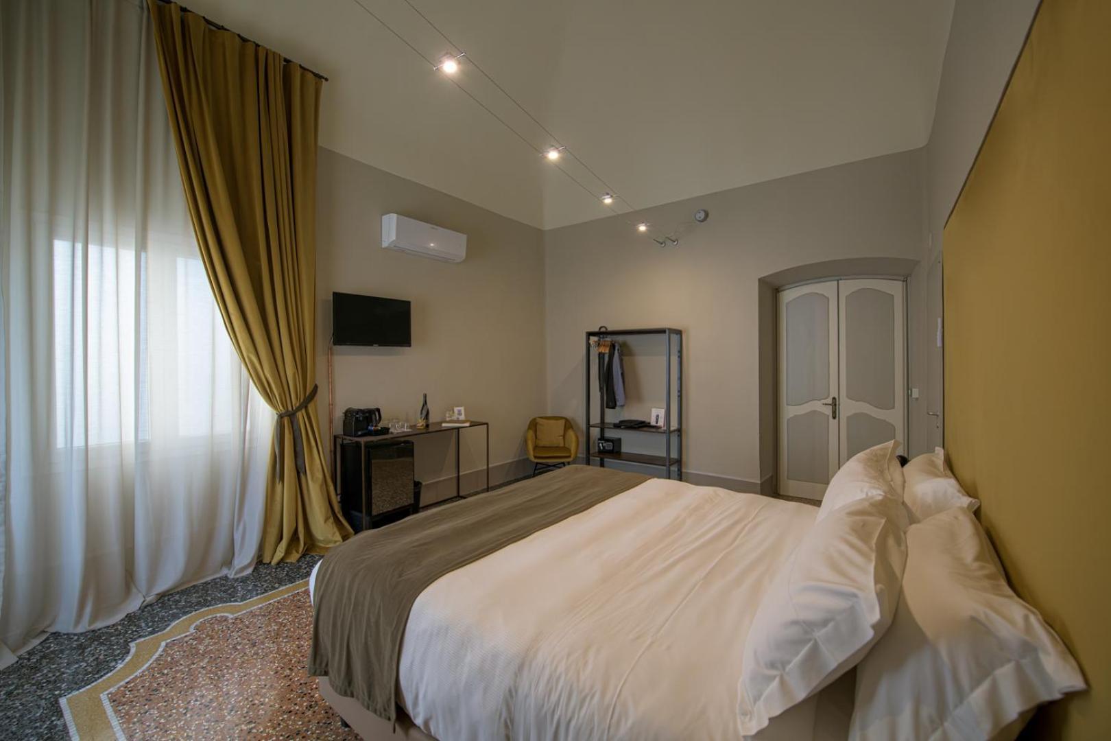 Palazzo Sertorio Suites Гави Екстериор снимка